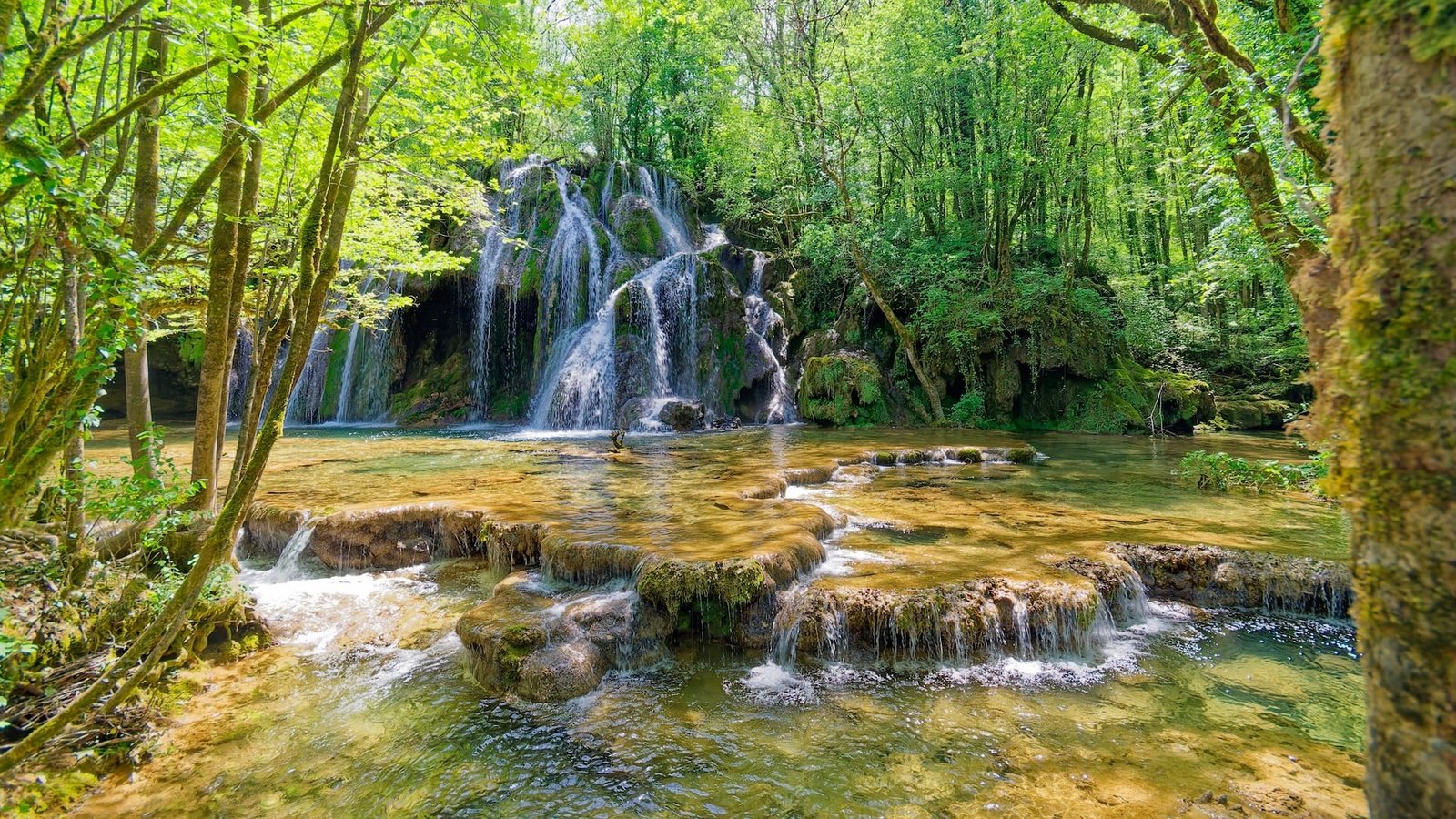 This Crystal-Clear Waterfall May Be France’s Best-Kept Natural Secret